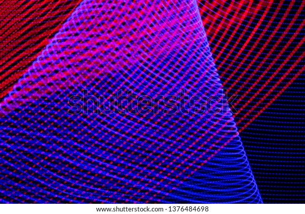 Abstract colorful lines on black\
background. Patterns of lines forming colorful\
figures.