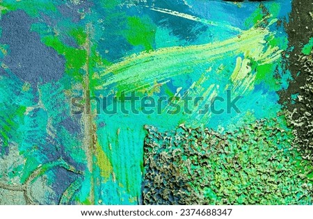 Abstract colorful paint background. Colorful paint stains on rough cement wall. Modern painting. Artistic colorful background. Abstract colorful paint banner made of painted rough cement wall.