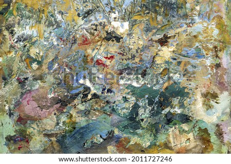 Abstract colorful painting palette. Bright abstract painting similar to a child's drawing traces of paint and blotches scratched surface. Macro oil thick paint vintage art wallpaper.