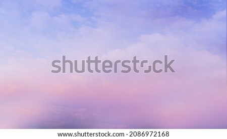 abstract colorful pastel tone of sunrise sky cloud background with shining light for design concept