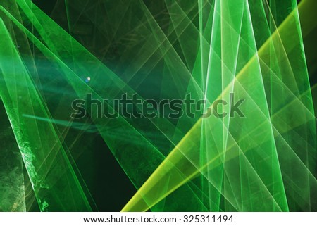 Abstract Colourful green laser show light in night
