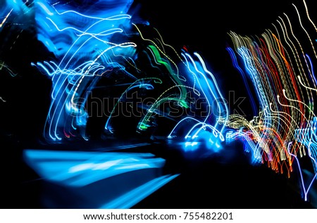 Abstract colurful lights, cars and road at night