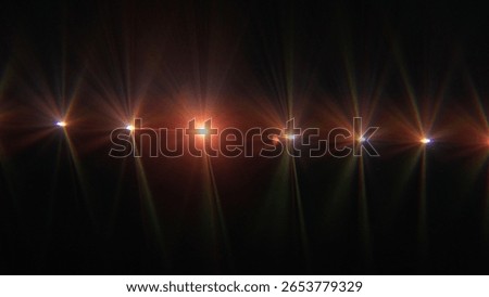 Abstract composition of bright projector light refracted and multiplied through a glass prism, creating vivid radial beams and spectral flares across a dark background.