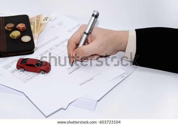 Abstract composition of car documents.\
Isolated on white\
background.