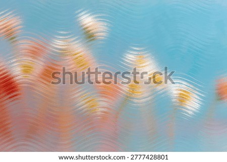 Abstract composition of flowers seen through textured embossed glass. The patterned glass surface creates a soft blur and diffused light effect, blending colors into a dreamy, modern aesthetic. Elegant interplay of transparency, distortion, and light makes this image perfect for contemporary backgrounds, branding, and artistic design projects.