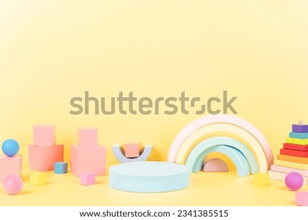 Abstract composition with geometric shapes forms. Exhibition podium, platform for product presentation on yellow background. Front view