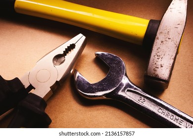 Abstract Composition Of Tool Kit Of Hammer, Pincers And On Wrench. 