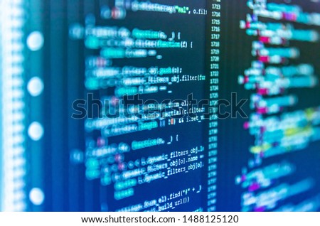 Abstract computer script about big data and blockchain database. HTML5 concept macro backdrop in warm colors. Shallow depth of field, selective focus effect. Blurred screen with selective focus