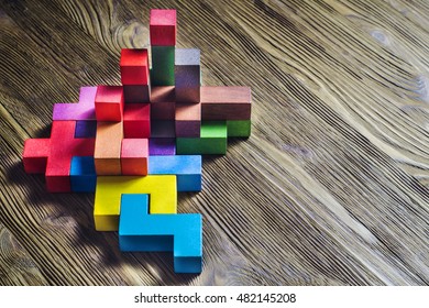 Abstract construction from wooden blocks with copy space. The concept of logical thinking, geometric shapes.