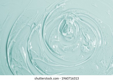 Abstract cosmetic background from transparent gel or antiseptic, hyaluron - Shutterstock ID 1960716313