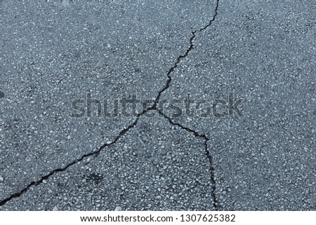 Abstract cracked background as basis for any creative design. Cement, asphalt floor fissure pattern. Crack texture. Cracked wall texture broken plate, abstract lines pattern distressed background