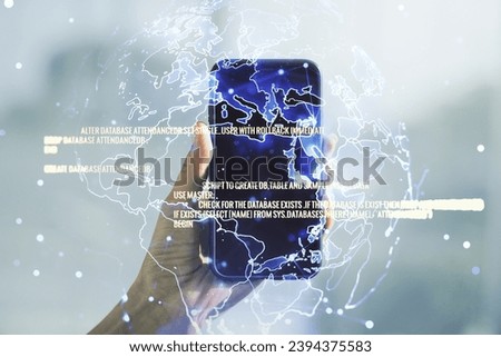 Abstract creative coding illustration with world map and hand with mobile phone on background, international software development concept. Multiexposure