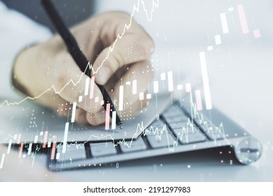 Abstract creative financial graph with hand writing in diary on background, financial and trading concept. Multiexposure