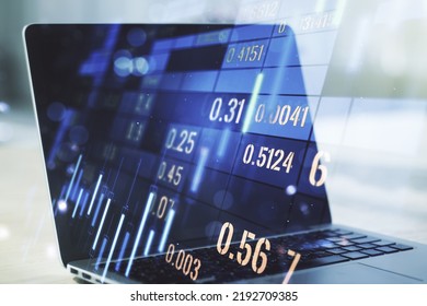 Abstract Creative Financial Graph On Modern Laptop Background, Financial And Trading Concept. Multiexposure