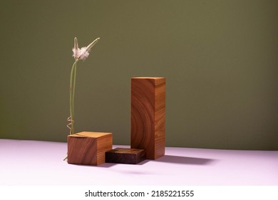 Abstract creative podium platform from various natural materials, dark green purple background - Shutterstock ID 2185221555