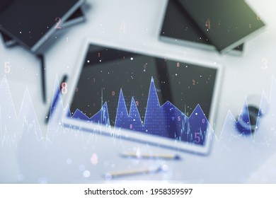 Abstract creative stats data concept and modern digital tablet on background, top view. Multiexposure