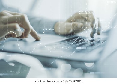 Abstract creative stats data concept with hands typing on laptop on background. Multiexposure - Powered by Shutterstock - Get 15% off with code: PIKWIZARD15