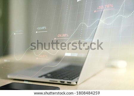 Abstract creative stats data concept on modern laptop background. Multiexposure