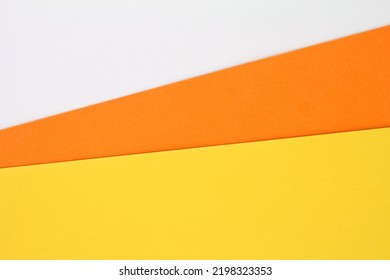 Abstract creative texture geometric candy corn pattern craft paper background. White, orange, yellow colors. Halloween autumn holiday concept. Top view with copy space for text, flat lay, close-up - Shutterstock ID 2198323353