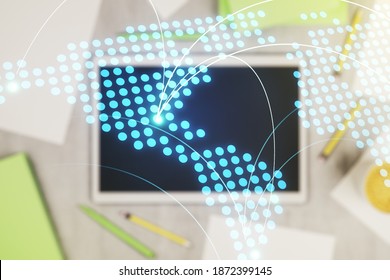 Abstract creative world map with connections and modern digital tablet on background, top view, international trading concept. Multiexposure