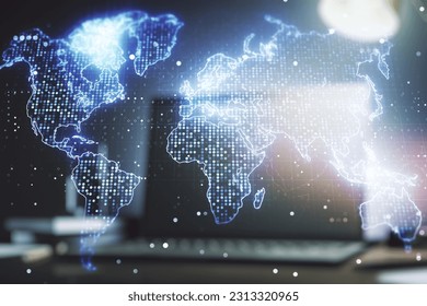 Abstract creative world map on modern laptop background, international trading concept. Multiexposure