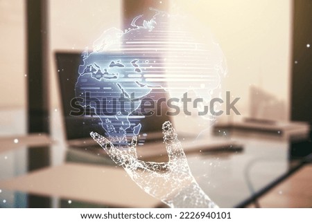 Abstract creative world map on modern laptop background, international trading concept. Multiexposure