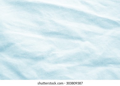 abstract crumpled blue light colors fabric texture backgrounds.