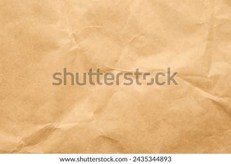 Abstract crumpled and creased recycle brown paper texture background