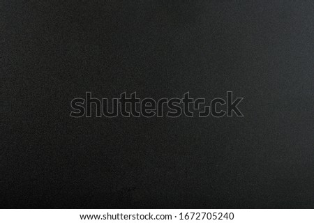 Abstract dark background. Black matte pattern  texture