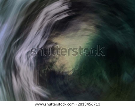 Abstract dark background with dramatic cosmic vortex and swirling motion blur trails