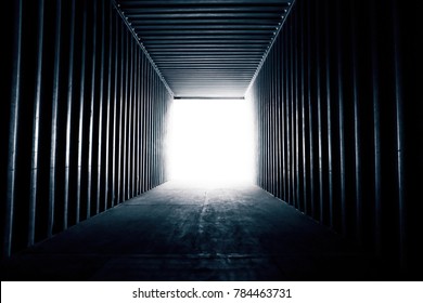 Abstract dark background. empty inside cargo container truck with blank white light outside.