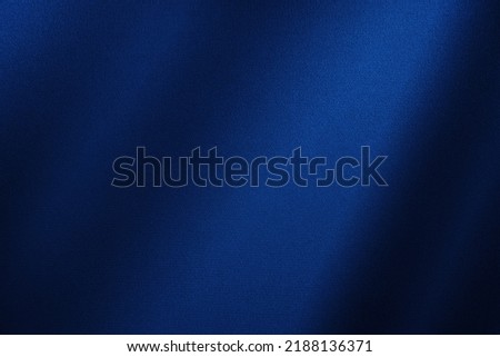  Abstract dark background. Silk satin fabric. Navy blue color. Elegant background with space for design. Soft wavy folds.  Christmas, birthday, anniversary, award. Template.                        