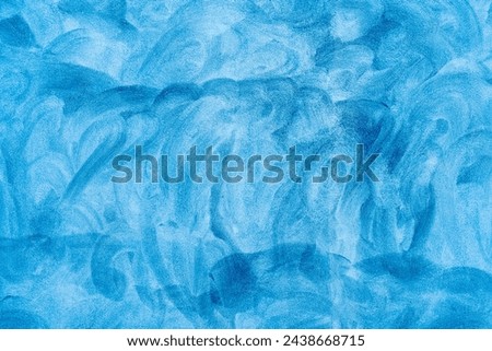 Abstract Dark blue toned painted congrete wall texture as background.