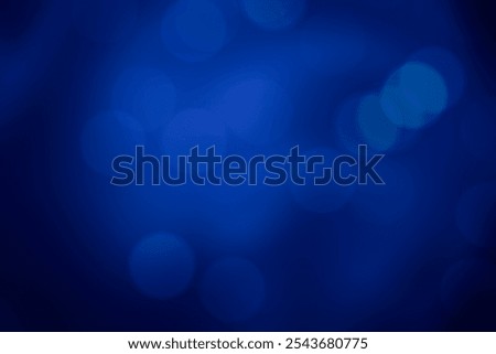 ABSTRACT DARK GRADIENT BLUE BOKEH BACKGROUND WITH BLACK TONES, BLURRY CIRCLES PATTERN DESIGN