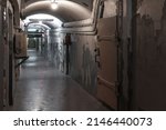 Abstract dark grungy industrial interior, underground military bunker