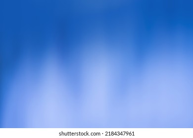 Abstract Dark Ink Blue Bokeh Background. Defocused Cobalt Blue Lights Background. 