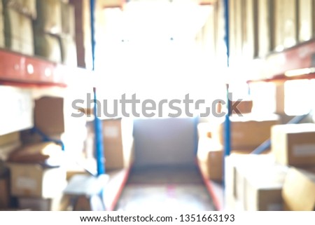 Abstract defocus blurred row of warehouse store background on shelf