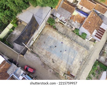 Abstract Defocused Blurred Background Aerial Outdoor Volleyball Court In The Middle Of Housing In Cikancung Area - Indonesia. Not Focus