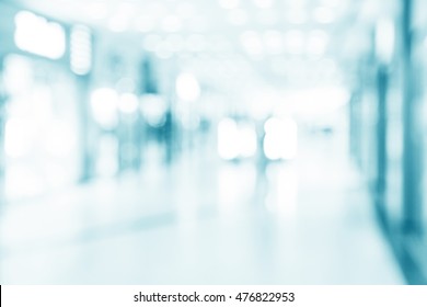 Abstract Defocused Blurred Background, Empty Business Corridor Or Shopping Mall. Medical And Hospital Corridor Defocused Background With Modern Laboratory (clinic)