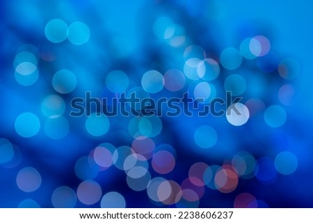 abstract defocused glowing light bulbs background, blur concept. Christmas wallpaper decorations. Festival Holiday Scenery, Glow Circle Illuminated Celebrations Display.