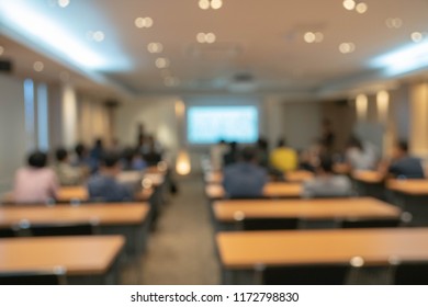 Abstract defocused photo of conference room or seminar room with attendee background, Business concept