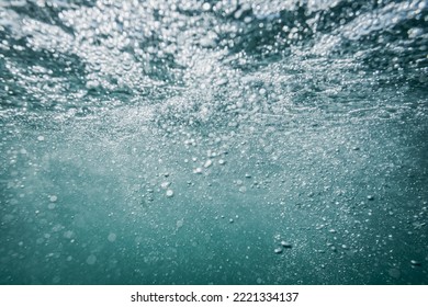 Abstract defocused underwater blue background.