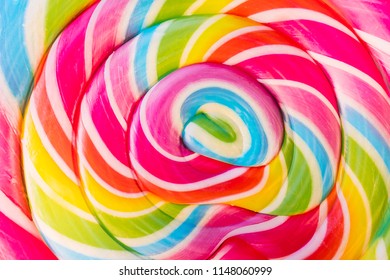 Abstract Design Rainbow Tie Dye Colors in Swirl Pattern in Large Lollipop Sucker - Powered by Shutterstock