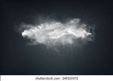 Abstract Design Of White Powder Cloud Against Dark Background