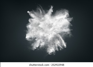 Abstract Design Of White Powder Cloud Against Dark Background