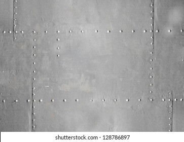 Abstract Detailed Gray Metal Wall Background Texture With Seams And Rivets