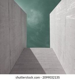 Abstract Details In Architecture. Exterior Walls, Straight Lines, Of An Construction Or Building Made Of Big Cement Blocks. Light Tones And Green Sky. Minimal, Modernism And Upward Looking Concept.