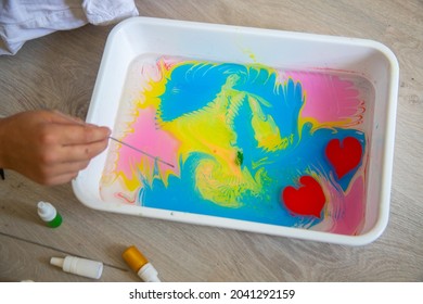 Abstract Drawing With Ebru Paints On Water, Water Paints, Art Therapy, Freehand Drawing, Blurred Background.
