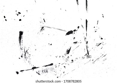 Abstract drops and smears of black acrylic paint isolated on a white background.