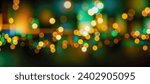 Abstract elegant dark green background with golden glowing effect. green and golden bokeh background. Holiday Abstract shiny green and gold bokeh and glitter for invitation.